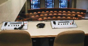 Interior of a typical translator's booth showing the Asia Pacific Hall below